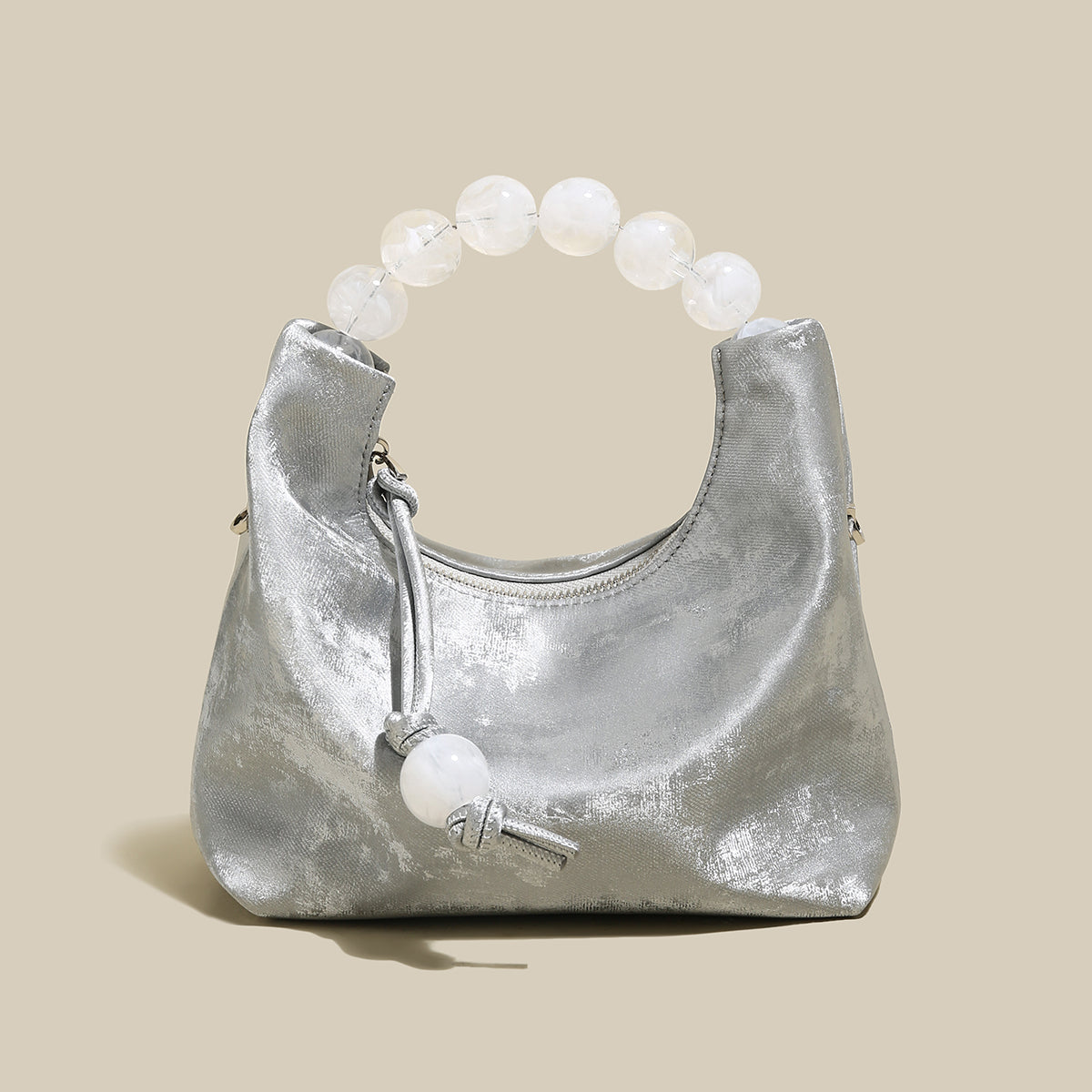 Silver Pearl Top Handle Bag with candy-like oversized pearl handle, perfect for chic occasions and evening events.