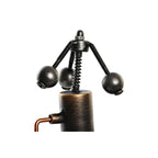 Metallic mechanical sculpture with springs and spherical components on a white background
