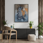 Modern interior with a black console table, wooden chair, and decorative plants.