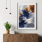 Framed abstract art piece on a wall above a wooden cabinet with a plant and books.