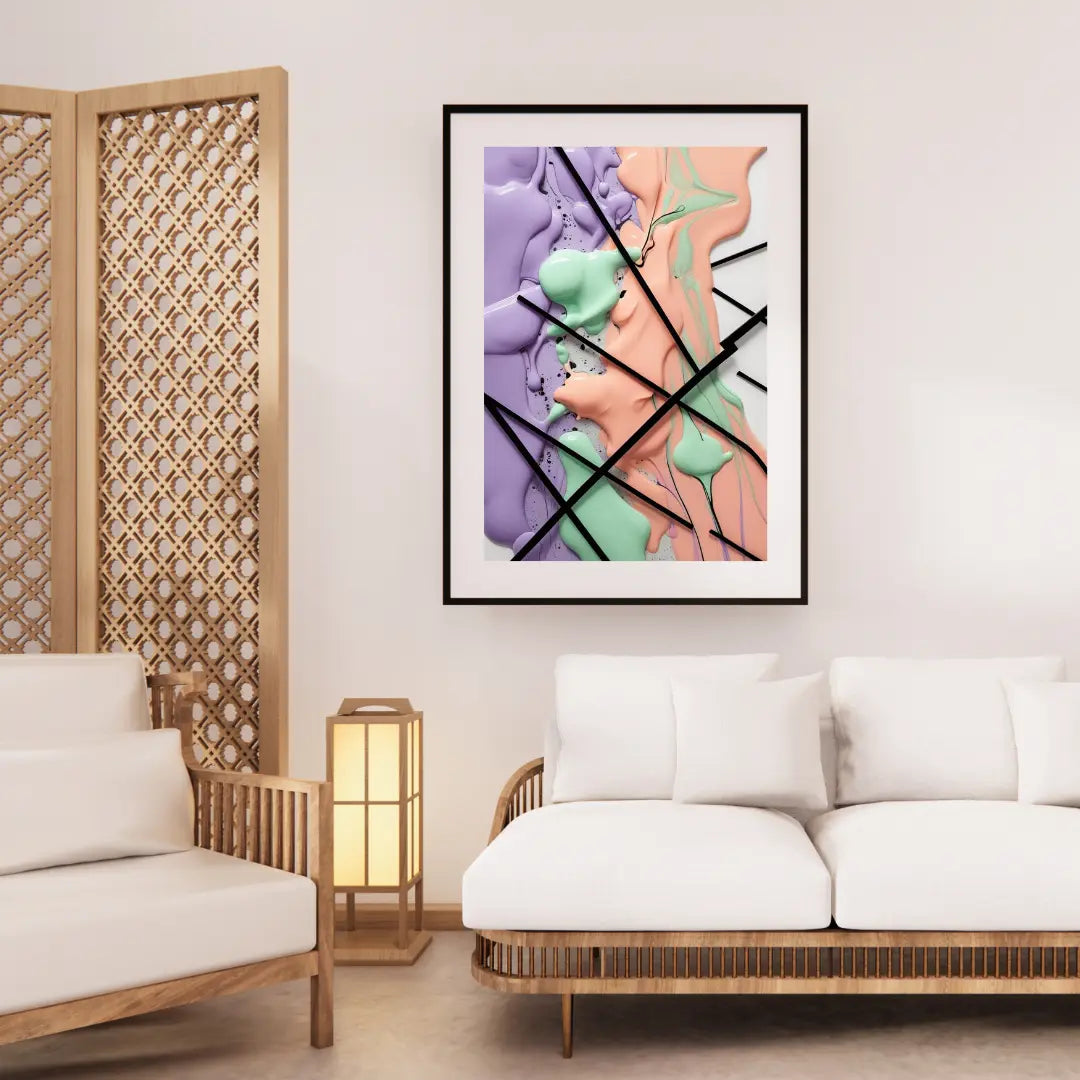 Abstract art piece in a modern living room with a white sofa and wooden armchair.