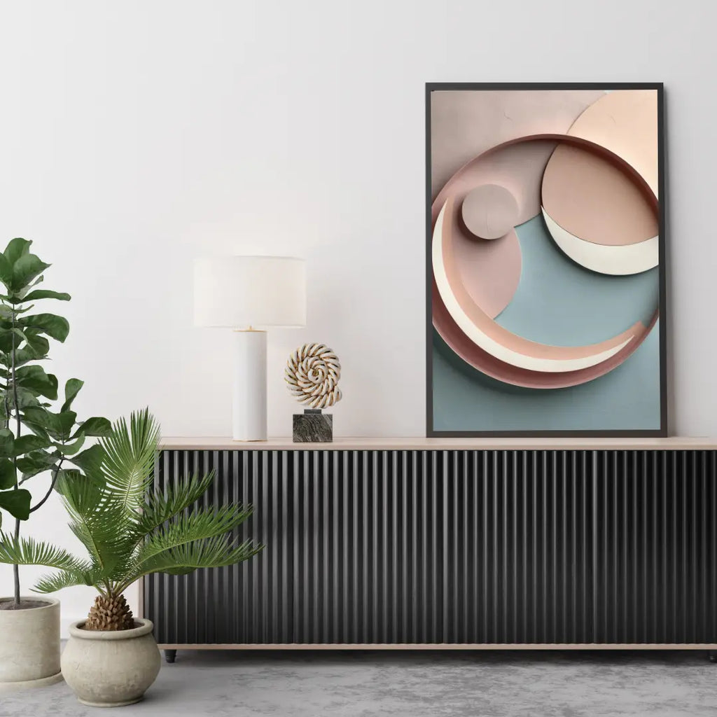 Abstract art piece on a wall above a console table with decorative items and plants.