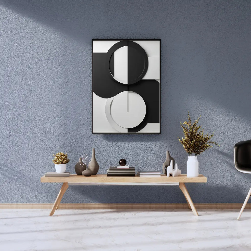 Modern interior design with abstract wall art, a wooden console table, and decorative items against a gray wall.