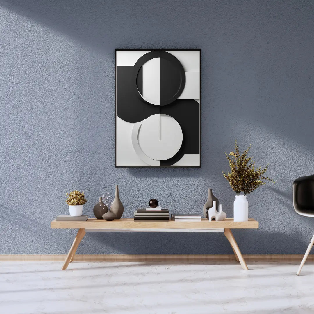 Modern interior design with abstract wall art, a wooden console table, and decorative items against a gray wall.