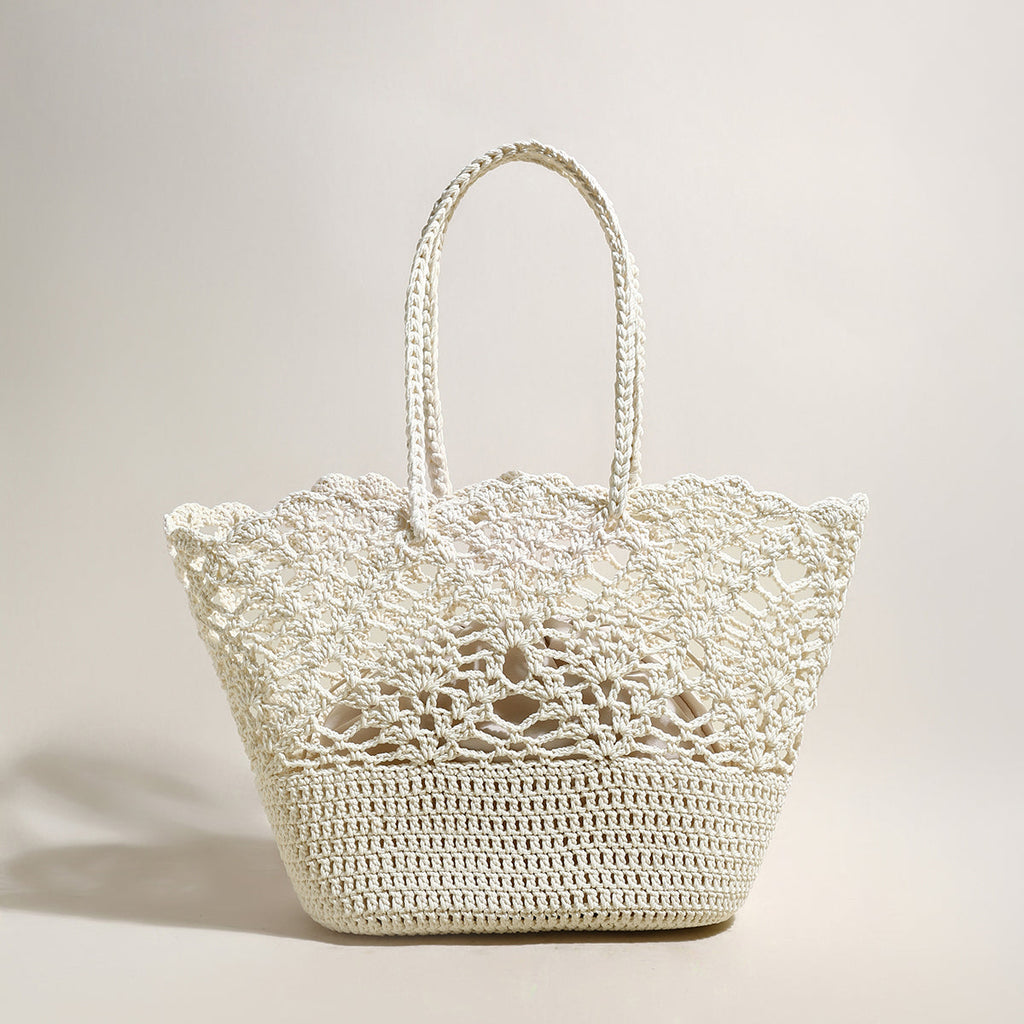 White woven handbag on a light background