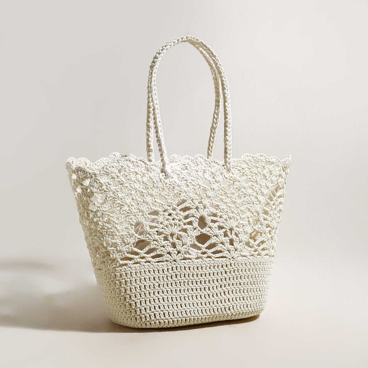 White crochet handbag on a light background