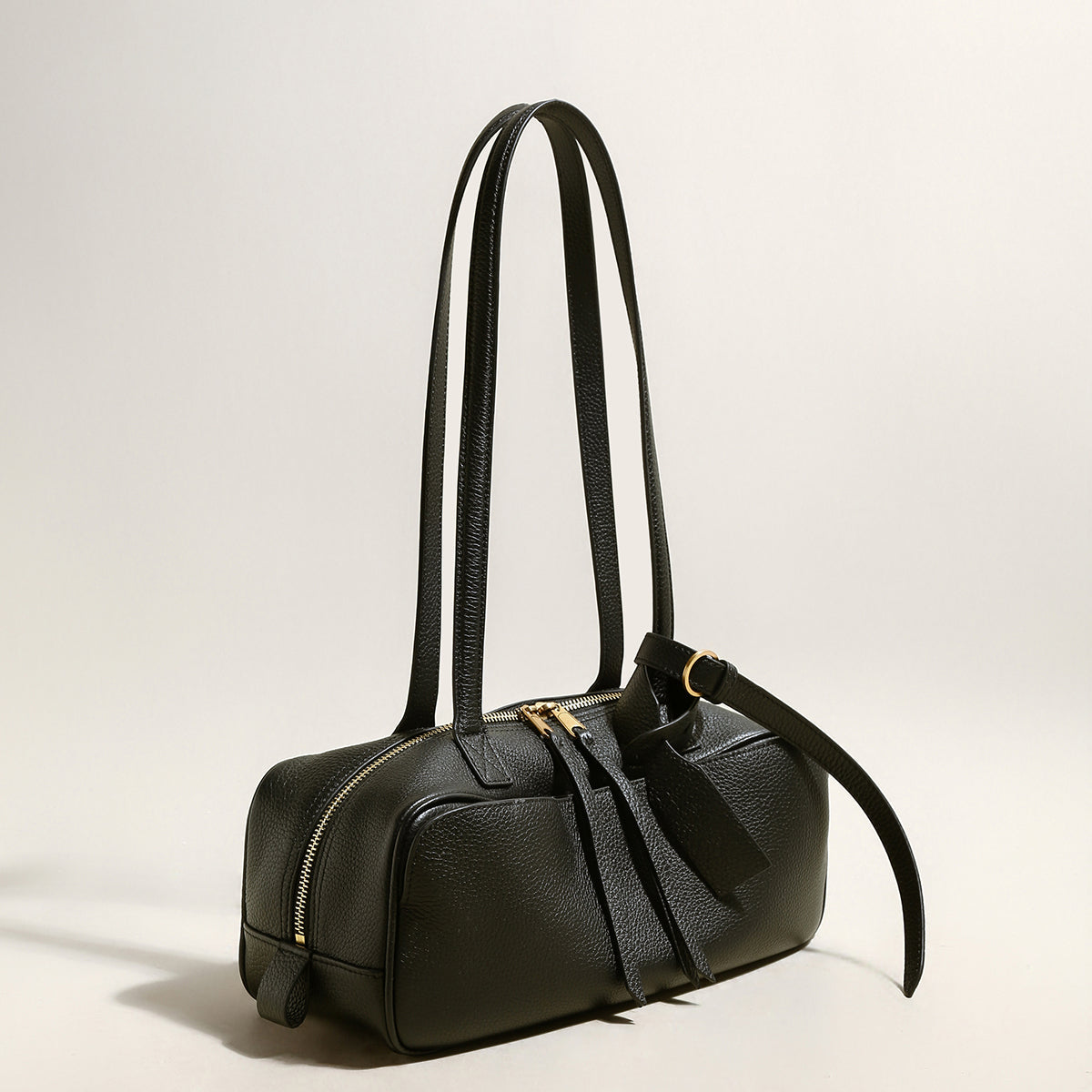 Mini Rectangular Knot Strap Shoulder Bag in black, showcasing sleek design and knotted straps for vintage charm.