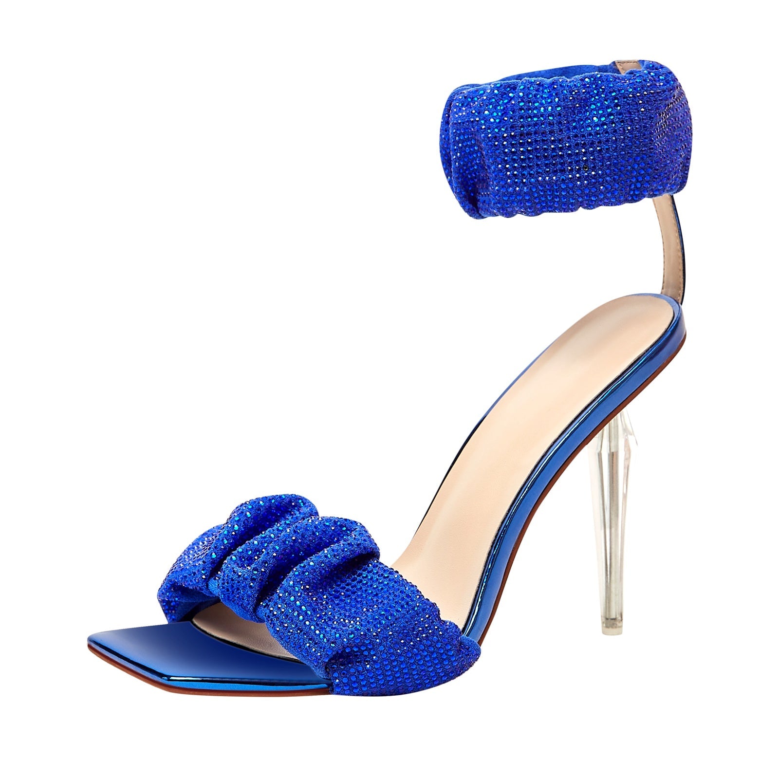 Blue high-heeled shoe with embellishments on a white background