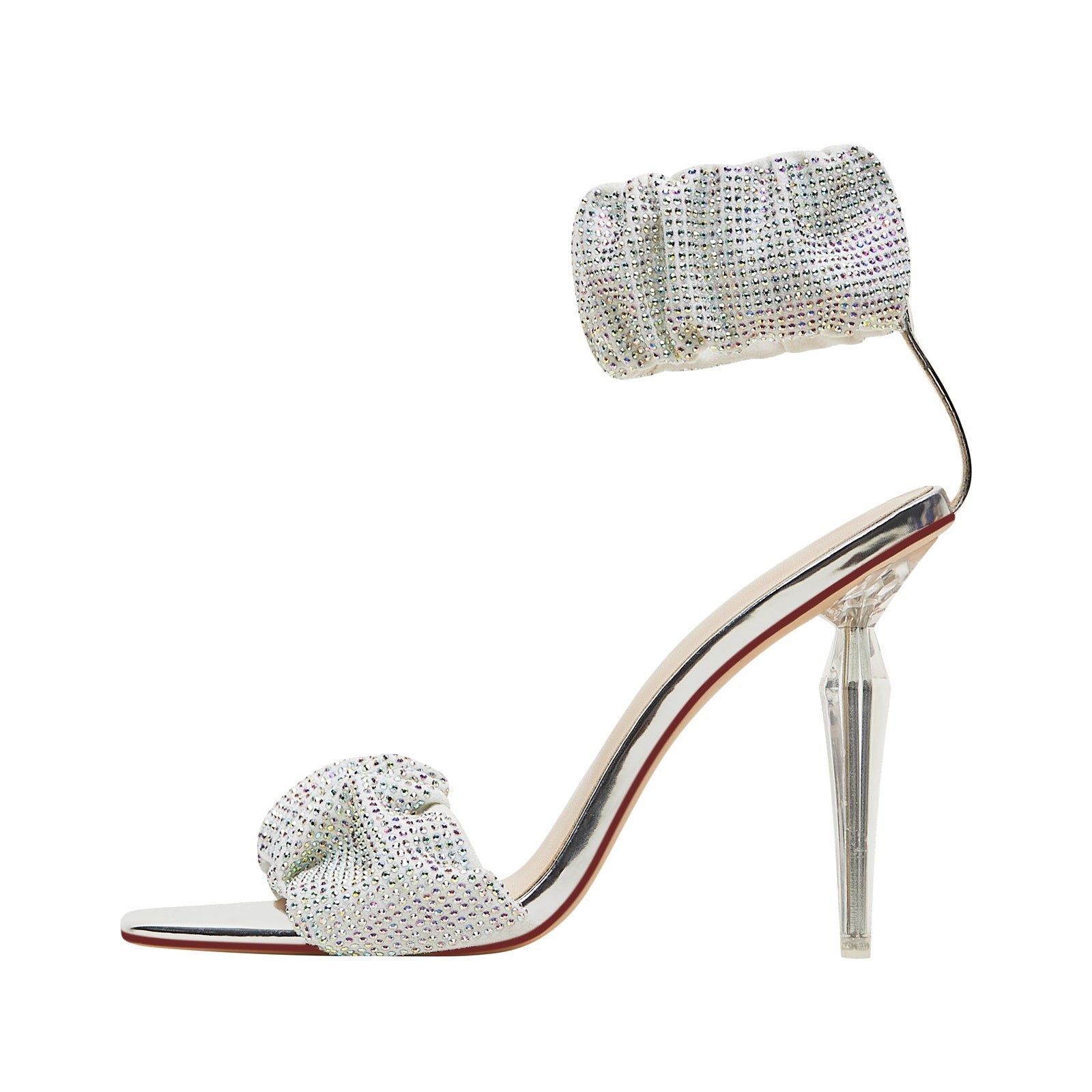 High-heeled shoe with crystal embellishments on a white background